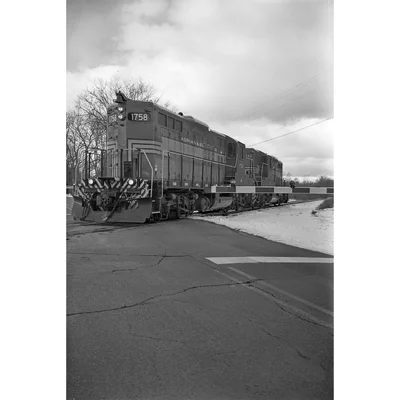 diesel locomotives crossing railroad grade crossing