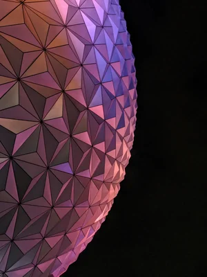 geometric sphere with triangular faceted surface pattern