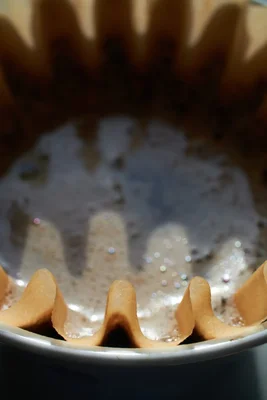 mixing bowl with cookie dough and electric beater