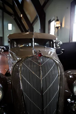 vintage car grille and hood ornament detail