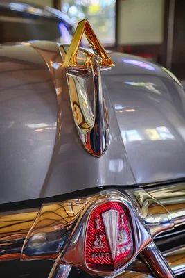 chrome hudson hood ornament on vintage car