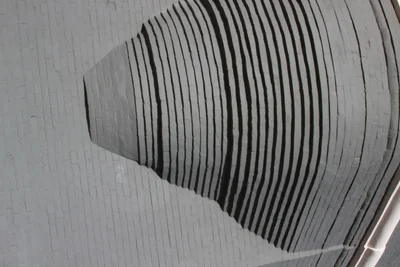 torn paper with black striped pattern